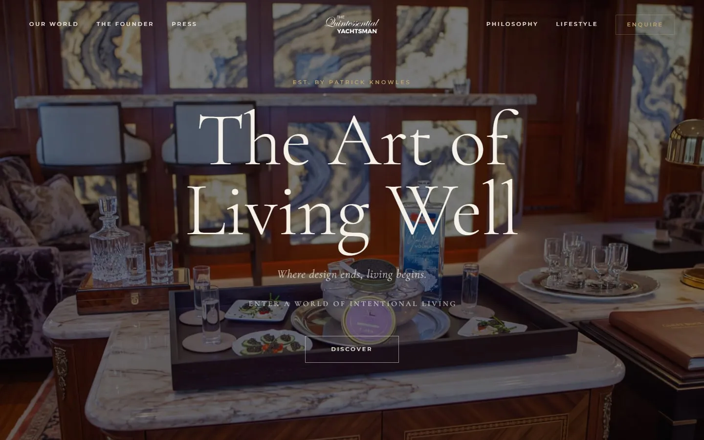The Quintessential Yachtsman homepage, “The Art of Living Well” in large serif type over a superyacht salon with caviar and vodka served on a marble table.